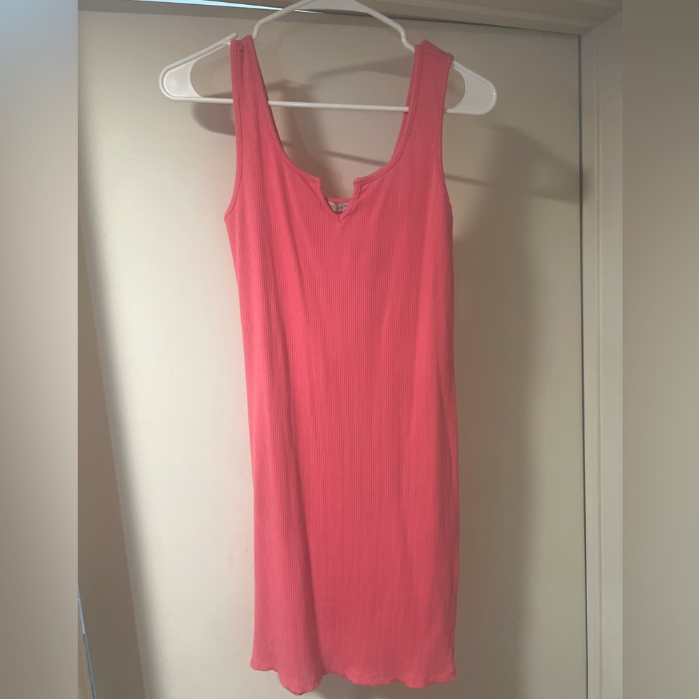 Women’s pink bodycon dress in size Medium. Mint Condition.